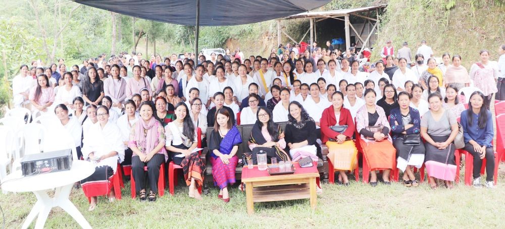 Weavers with officials during the opening of Li Cheh Kro Weavers’ Producer Company Limited Common Facility Centre at Chizami village, Phek on September 27.